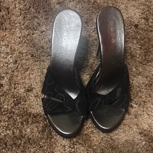 Bebe Black Heeled Mules with Twisted Strap